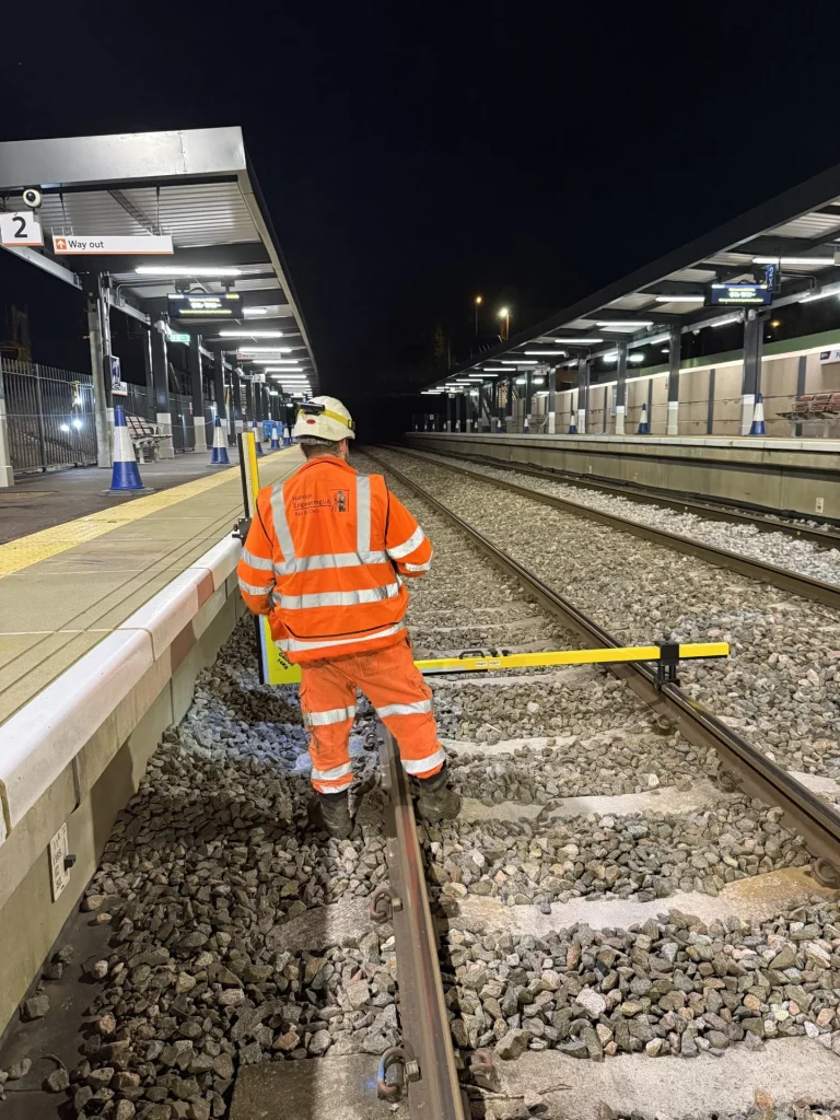 Hannon engineer carrying out track checks at a railway station