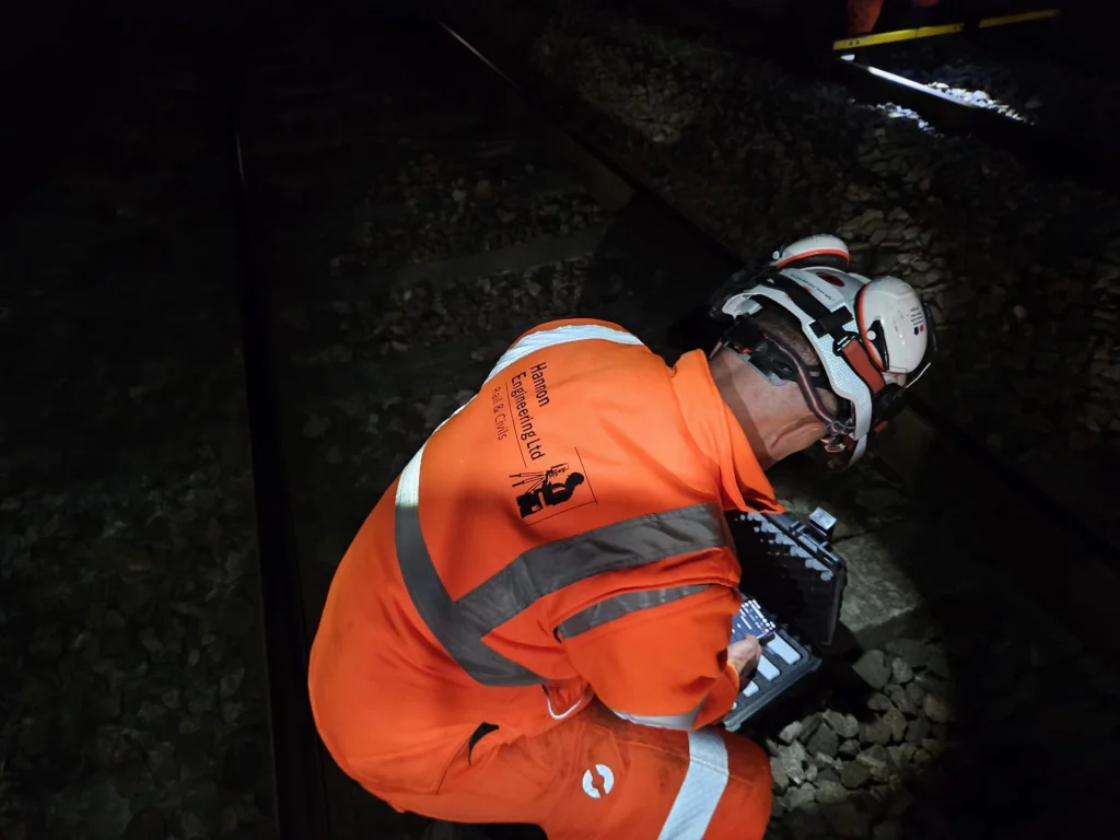Hannon team carrying out rail work during a night possession